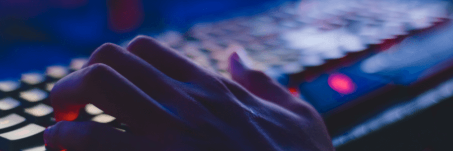 hand on computer keyboard